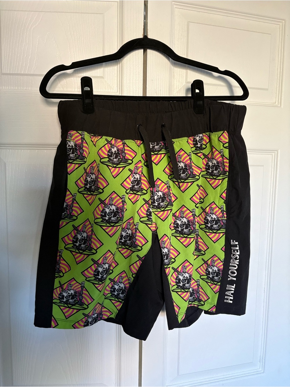 Last Podcast on the Left Black & Neon Green Skull Pattern Shorts